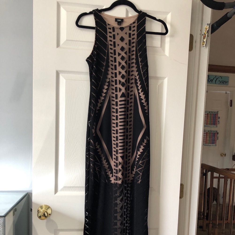 Women’s black and nude patterned dress size xs